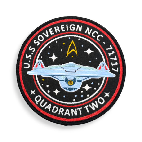 A lovely brightly coloured woven patch featuring a Star Trek spaceship.